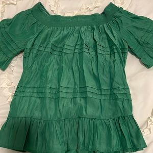 This fun Kelley green top is perfect for a girls night out or date night.